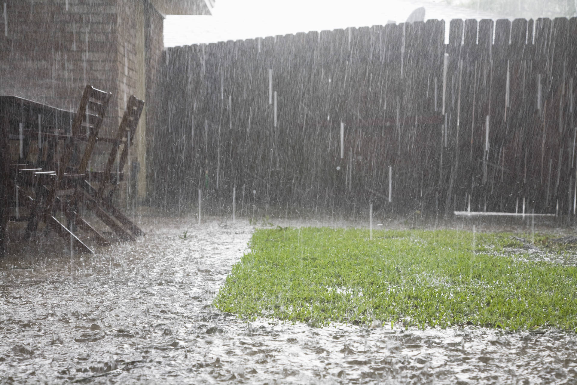 Heavy rainfall in a backyard